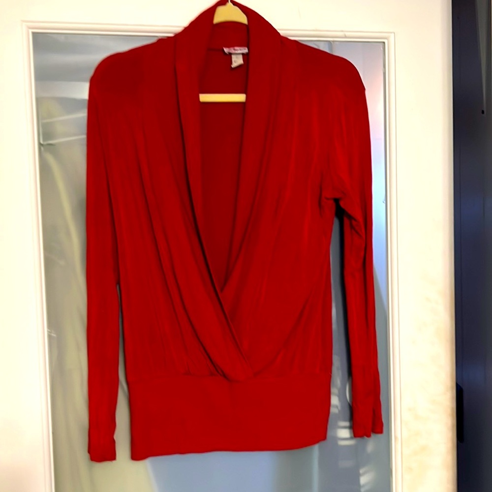 Red crossover top with banded bottom.